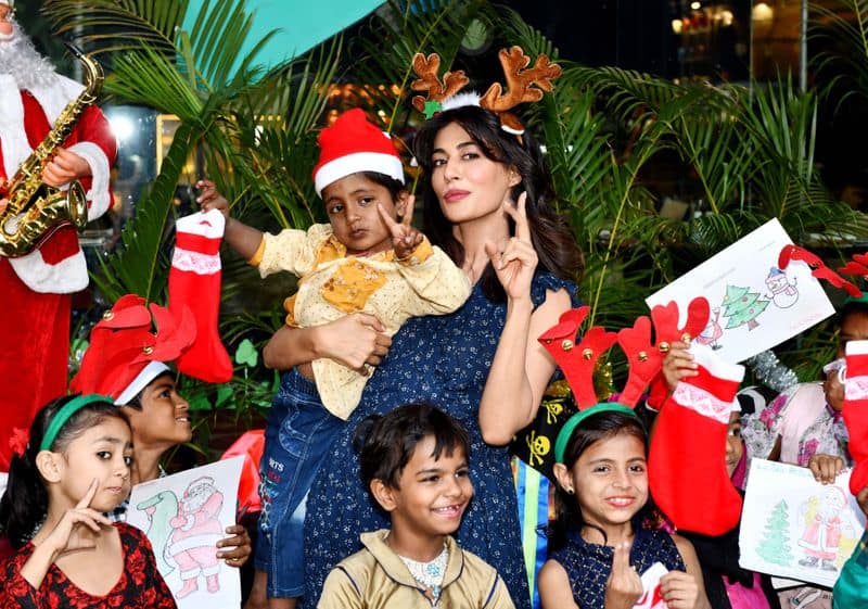 Chitrangda enjoys with NGO Children and have fun during Christmas celebration.