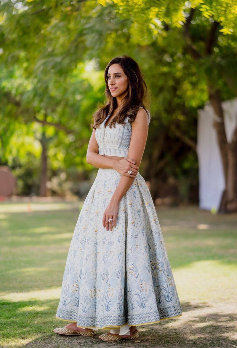 Danielle Jonas opted for a gorgeous muted Anita Dongre lehenga and paired it with matching juttis for a Indian wedding look.