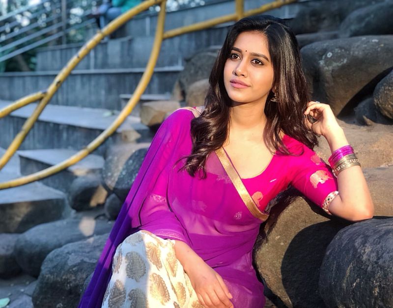 heroin nabha natesh stuns in saree in her latest photos ksr