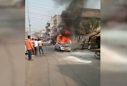 IN THE MIDDLE OF MARKET CAR CATCH FIRE