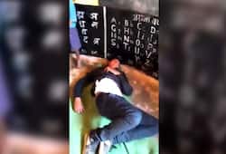 action against school teacher in mp who found drunk in school