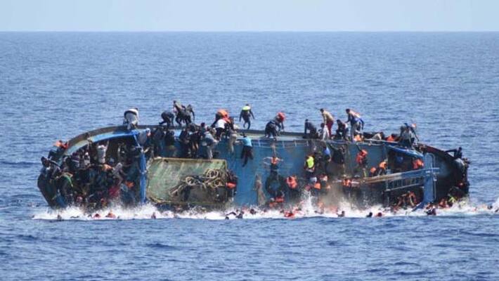 Boat sinking in Mediterranean sea Boat sinking in Mediterranean sea