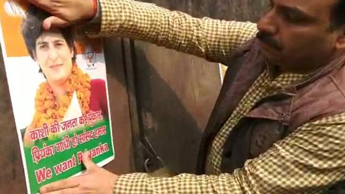 congress workers want modi vs priyanka fight in varanasi put up posters in her support congress workers want modi vs priyanka fight in varanasi put up posters in her support