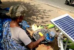 Technology Bengaluru corn seller Selvamma gets solar-powered DC fan makes life easy Selco company video