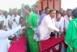 Siddaramaiah manhandles woman grievance meet Karnataka BJP sees red
