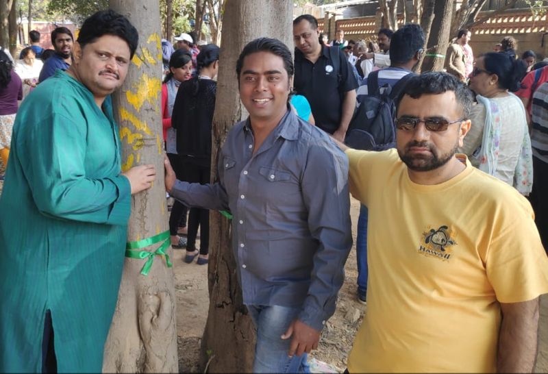Members of Citizens for Bangalore staged a protest in front of Cauvery Junction demadning to protect trees from felling
