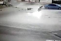 Accident captured CCTV College girl hits bike speeds off without stopping car