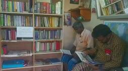 Tamil Nadu Barber installs mini library salon encourage reading