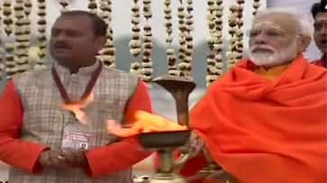 PM Modi takes holy dip at the Triveni Sangam, honours sanitation workers