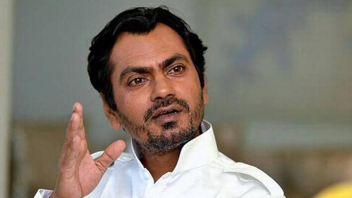 Nawazuddin Siddiqui pulled and dragged by fans Nawazuddin Siddiqui pulled and dragged by fans