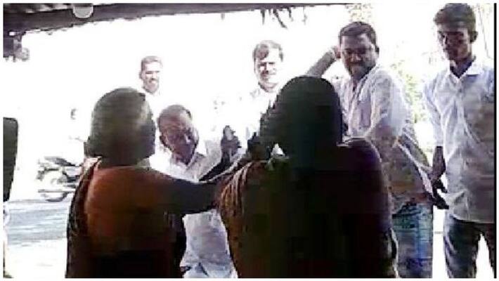 dmk man who attacks woman in shop expelled from part video dmk man who attacks woman in shop expelled from part video