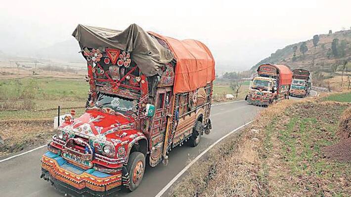 Maharashtra Police seize two container trucks transporting 300 migrant workers Maharashtra Police seize two container trucks transporting 300 migrant workers
