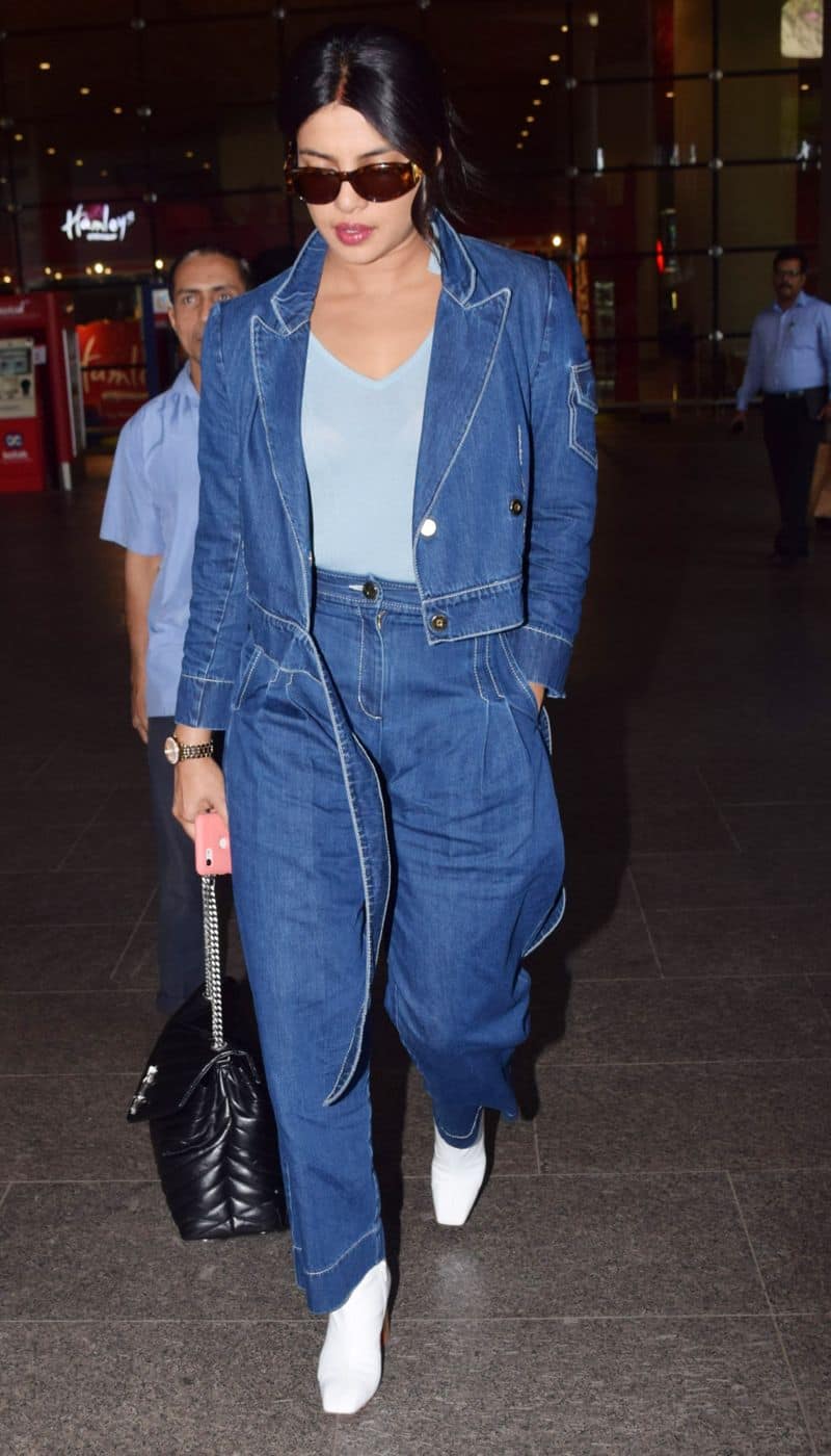 Priyanka Chopra keeps it casual with the timeless denim-on-denim look and glossy, moisturised lips. Hydration is the key for a perfect airport look.