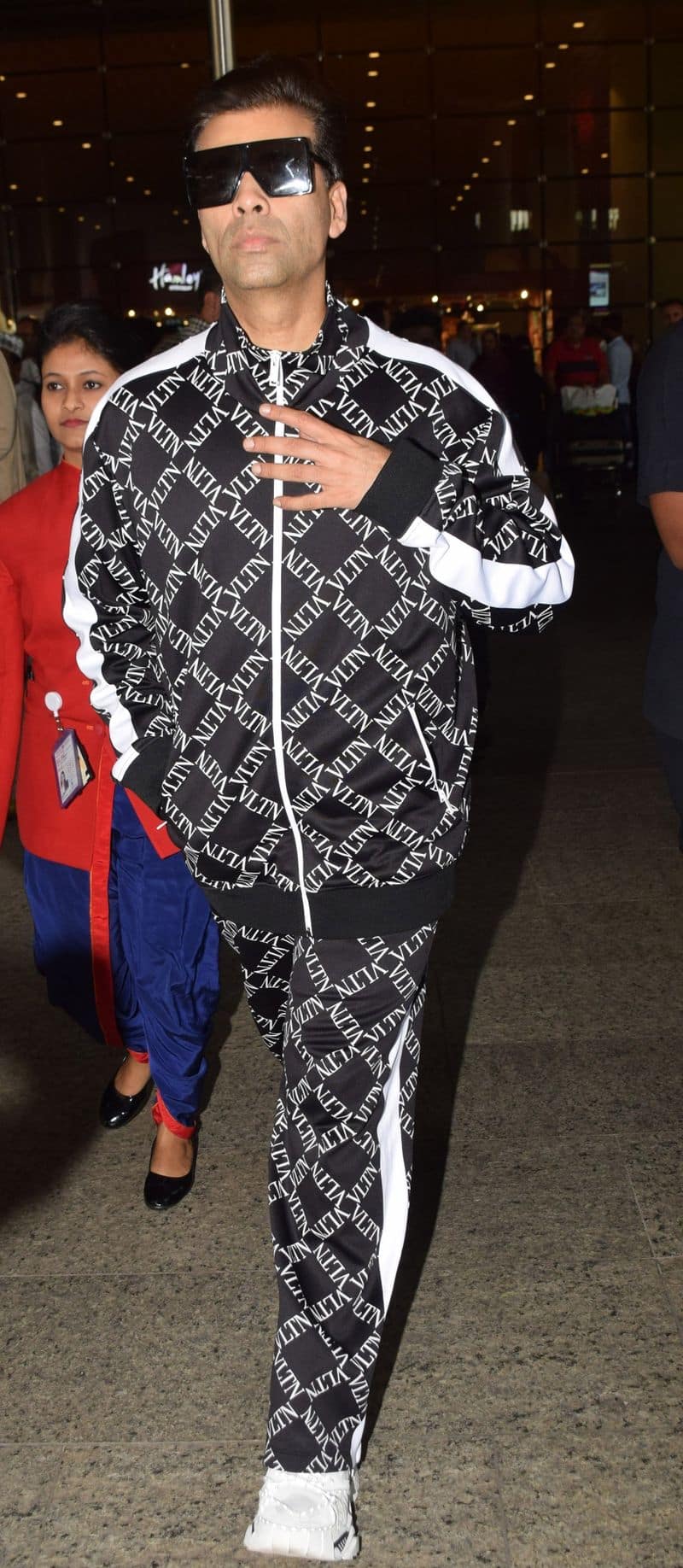 Head-to-toe Valentino? Well, it can only be Karan Johar who keeps his airport look very couture.