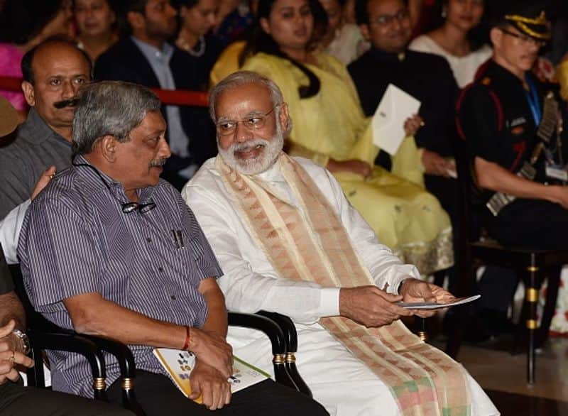 Prime Minister Narendra Modi with Manohar Parrikar during a Defence Investiture Ceremony at Rashtrapati Bhawan, on May 7, 2016 in New Delhi