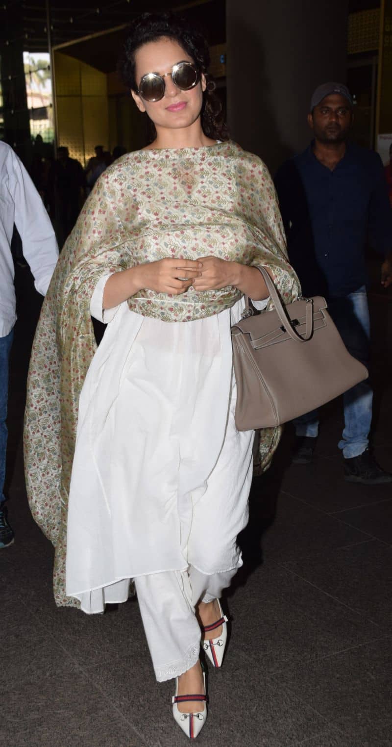 Always chic, Kangana Ranaut keeps it simple and stylish with her salwar-kameez airport outfit.