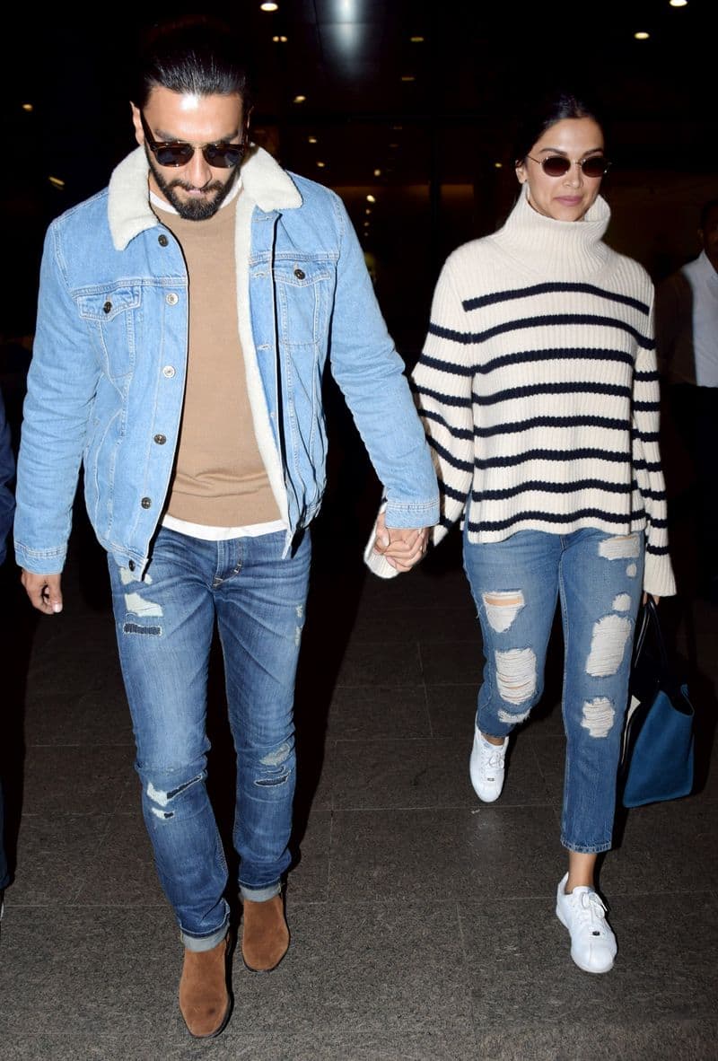 Another celeb sighting at the airport this week, as actors Ranveer Singh and Deepika Padukone rocked preppy denim travel outfits.