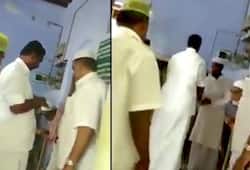 Panneerselvam son caught camera while bribing voters college premises