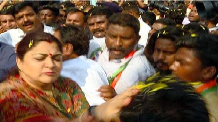 Congress leader Kushboo slaps youth during roadshow in Bengaluru Congress leader Kushboo slaps youth during roadshow in Bengaluru