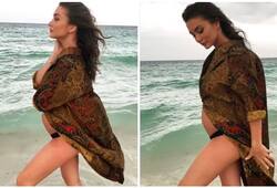 amy jackson flaunts her baby bump and enjoy her pregnancy time