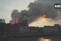 Notre-Dame Cathedral blaze: Parisians console each other amid talks of rebuilding