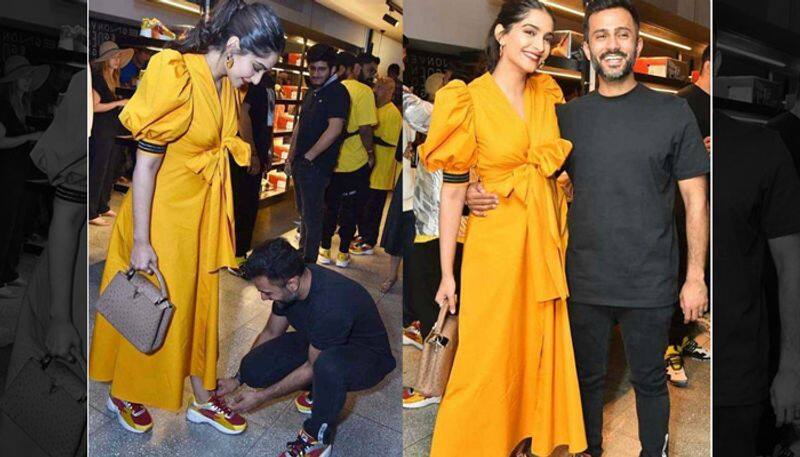 Anand Ahuja goes down on kness to tie Sonam Kapoor shoelace