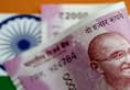 Rupee falls 17 paise against USD in early trade; Weak dollar, softening crude prices restricts drop