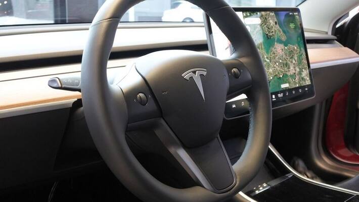 Greek PM gets inside the most-affordable Tesla Greek PM gets inside the most-affordable Tesla