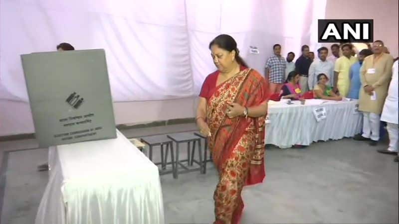Former Rajasthan CM and BJP leader Vasundhara Raje Scindia casts her vote at polling booth number 33 in Jhalawar.