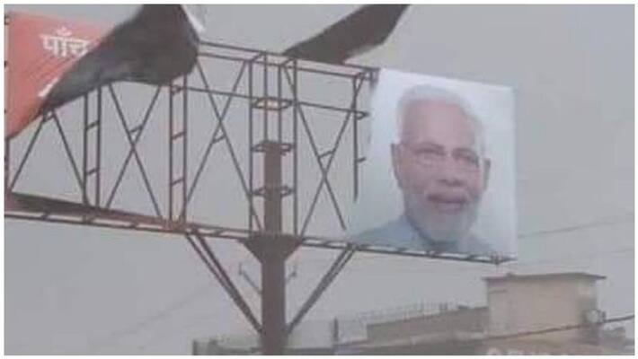 modi banner doesnot affected even by fani cyclone and bjp enjoys about this incident modi banner doesnot affected even by fani cyclone and bjp enjoys about this incident