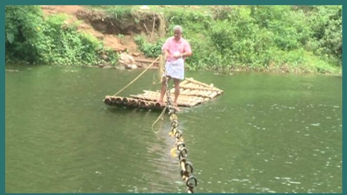 bridge destroyed in flood idukki village alady gets a risky journey to meet both ends bridge destroyed in flood idukki village alady gets a risky journey to meet both ends