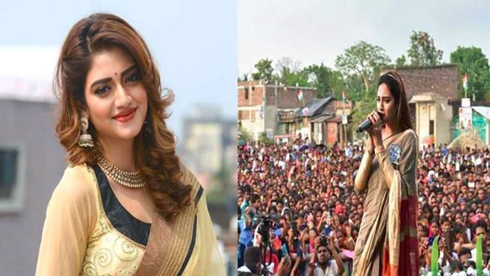 Selfie Rush With Trinamool congress candidate Nusrat Jahan Makes Stage Crash At Rally Selfie Rush With Trinamool congress candidate Nusrat Jahan Makes Stage Crash At Rally