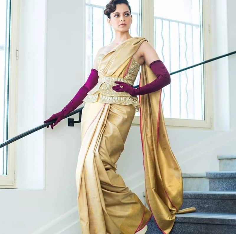 Actress Kangana Ranaut, who chose to flaunt a traditional Kanjeevaram sari styled with a twist with a corset and gloves at the 72nd Cannes Film Festival.