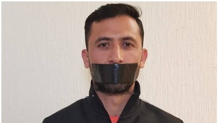 Junaid Khan with black tape on mouth Junaid Khan with black tape on mouth