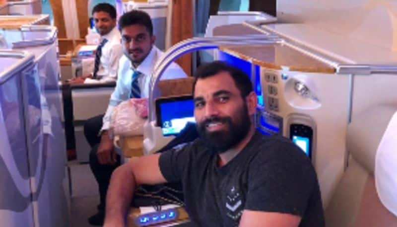 Mohammed Shami, Vijay Shankar and Raghavendra (throw-down specialist) are pictured inside an aircraft in Mumbai before their departure to London.