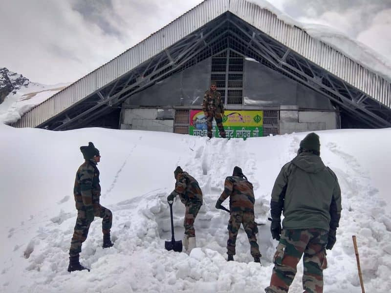 Indian Army teams comprising of Surya Bengal Sappers are braving the harsh weather to clear 6km route, which currently covered in snow.