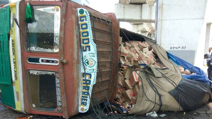 beer bottles loded lorry roll over at begumpet in hyderabad beer bottles loded lorry roll over at begumpet in hyderabad