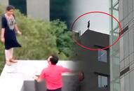 Women working in MNC climbed on building after fired from job in Haryana Gurugram