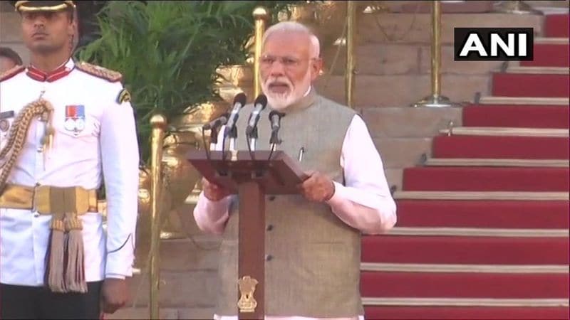 Narendra Modi was the epicentre of attraction all through the evening at Rashtrapati Bhavan. The man who single-handedly ensured BJP comes back to power, without any need of ally help was dressed in a crisp white kurta and ash-coloured Modi jacket as he was sworn in.