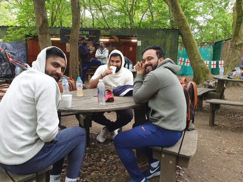 Ravindra Jadeja, Rohit Sharma and Kedar Jadhav relaxing after a team bonding session. In the background, Kohli is seen