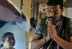 Salesman praising modi and selling his toy in train