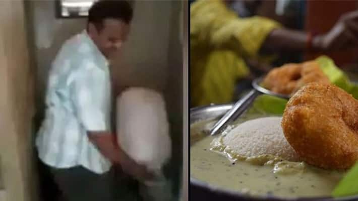 Street Vendor Making Idli chutney with Toilet Water in mumbai Street Vendor Making Idli chutney with Toilet Water in mumbai
