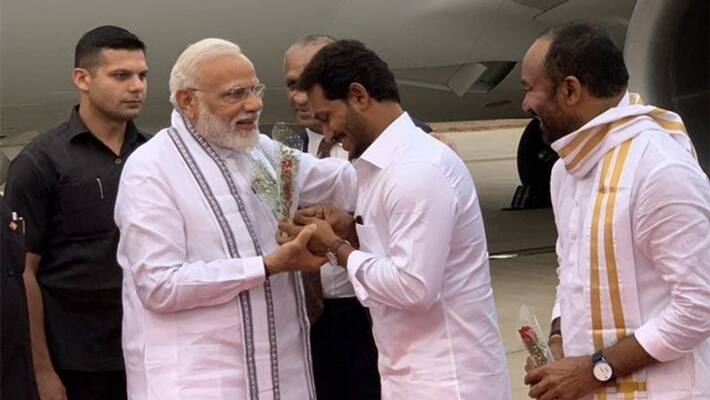 ys jagan mohan reddy receives modi at tirupati ys jagan mohan reddy receives modi at tirupati