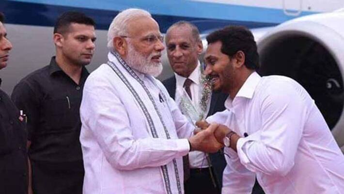 AP CM ys jagan tries to touch PM narendra modi feet AP CM ys jagan tries to touch PM narendra modi feet
