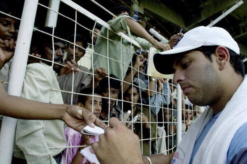 Yuvraj obliges fans after a net session in Chennai in 2004
