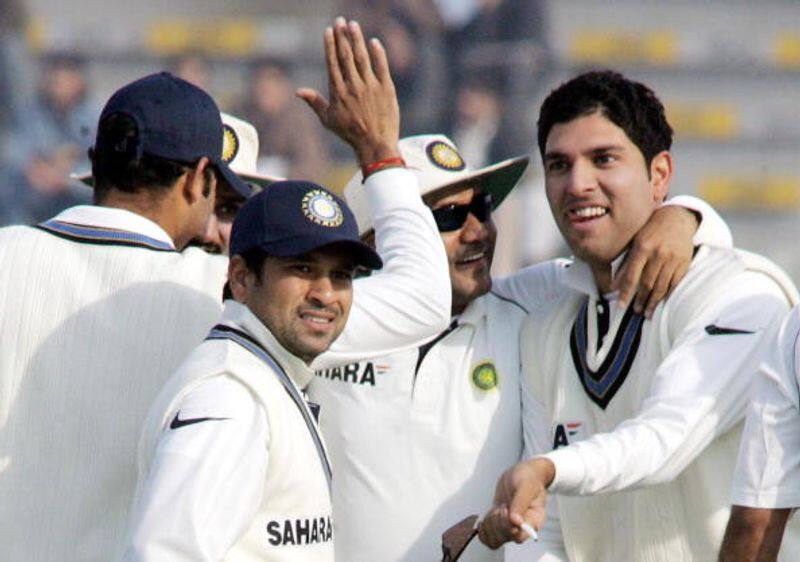 Yuvraj celebrates a wicket with teammates during an India-Pakistan Test in 2006