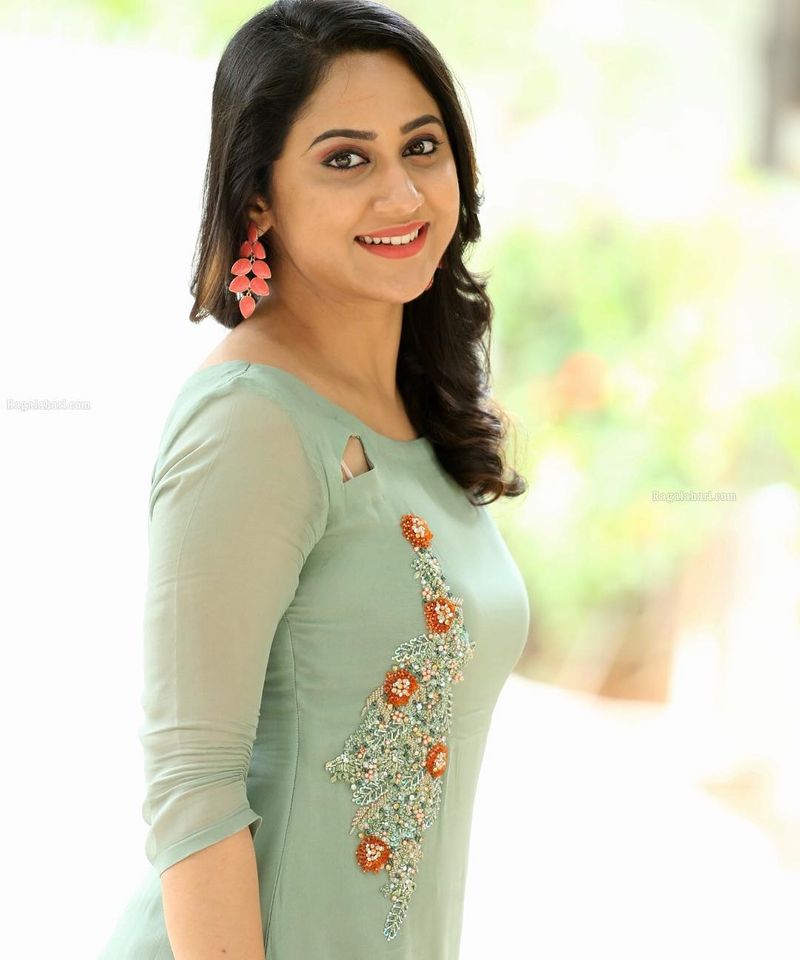 Colorful photos of actress Miya George
