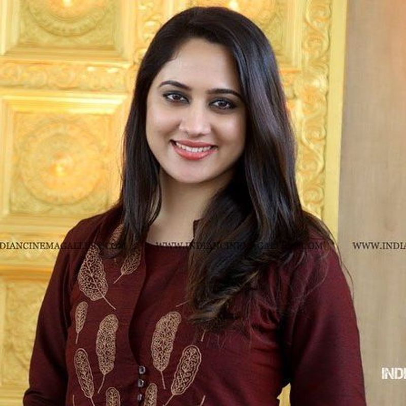 Colorful photos of actress Miya George