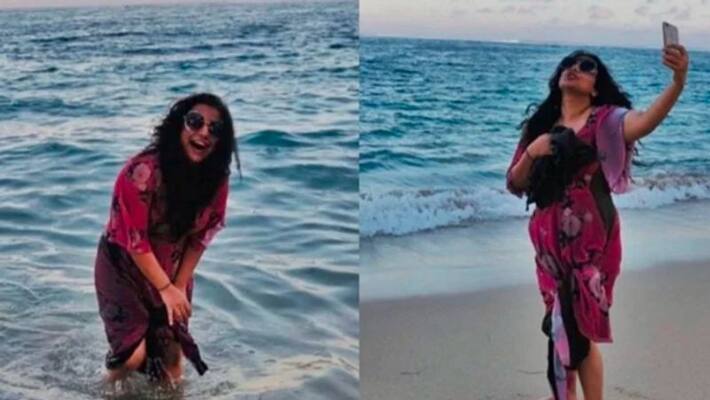 vidya balan play in beach water like cild vidya balan play in beach water like cild