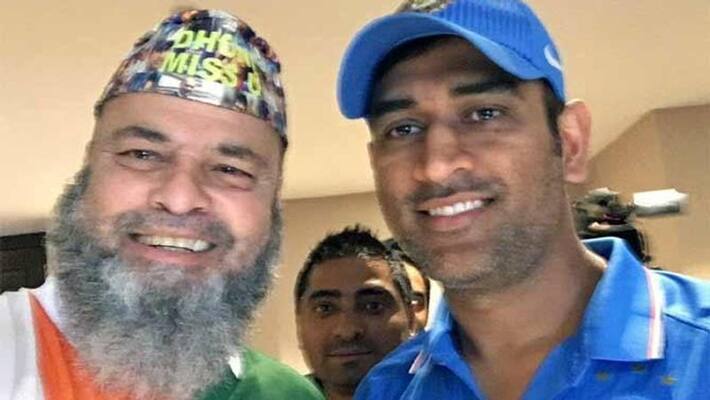 world cup 2019: ms dhoni helps his pakistani fan world cup 2019: ms dhoni helps his pakistani fan
